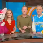 TV hosts with puppet character on Viral Music FM show.