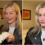 Happy blonde girl smiling and enjoying Christmas festivities.